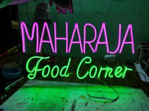 Affordable LED neon printing services offering budget-friendly options for food corner decorations.
